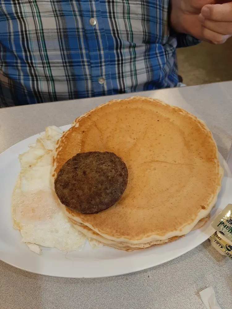 Over Easy Eggs Sausage and Pancakes